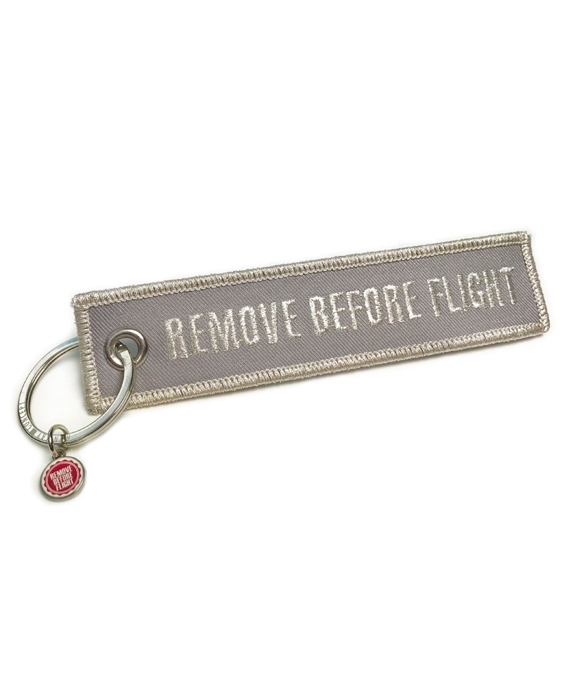 Schlüsselanhänger REMOVE BEFORE FLIGHT - silberfarben